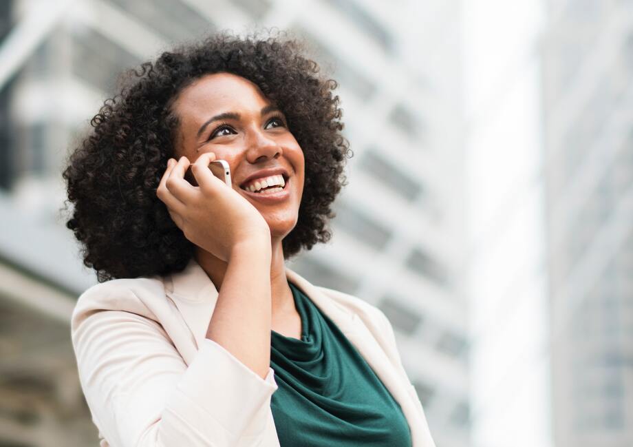 Lady with a mobile phone to her ear