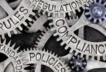 Cogs with the wording, regulations, legislation, policies, compliance