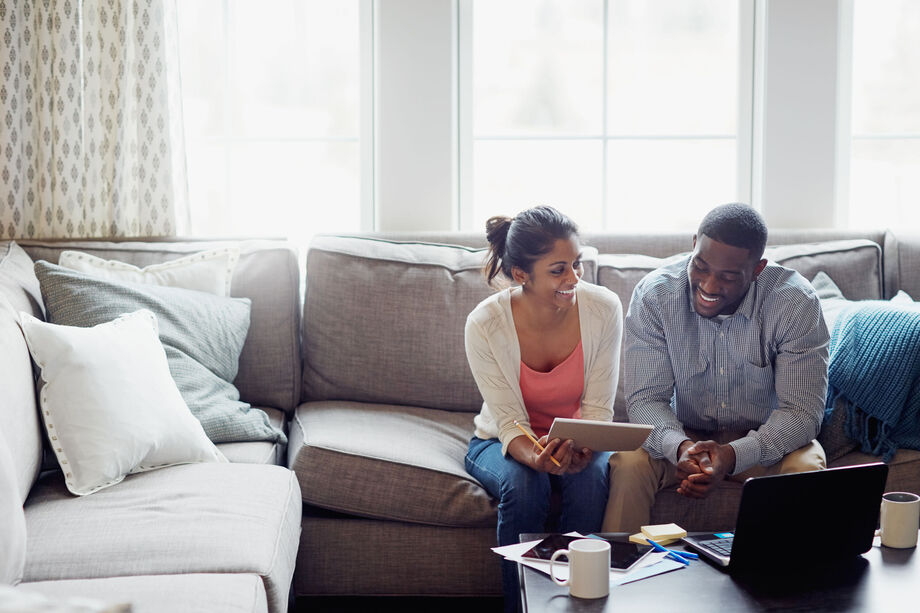 Couple sat on a sofa