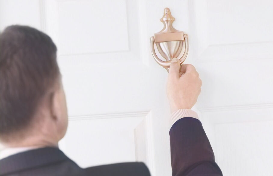 A landlord knocking on a tenant's door