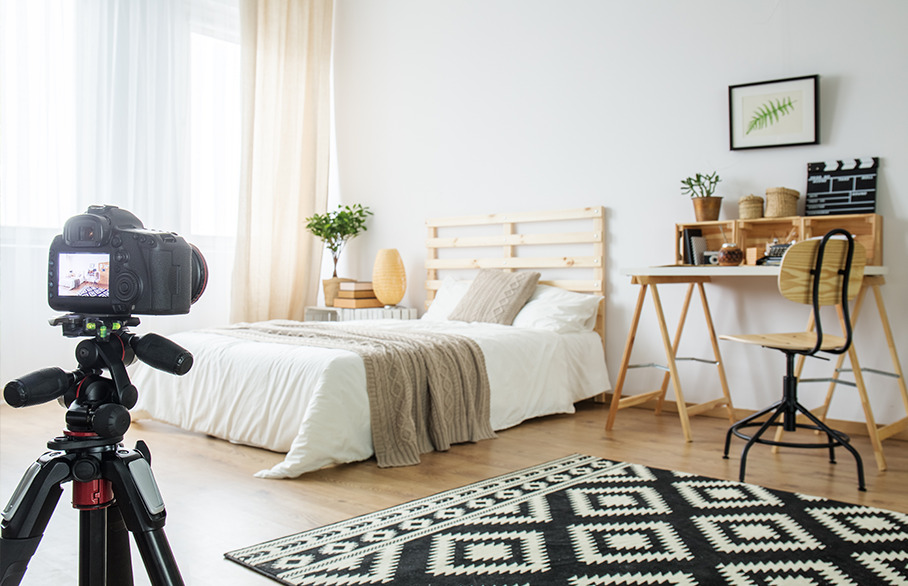 Camera on tripod in bedroom