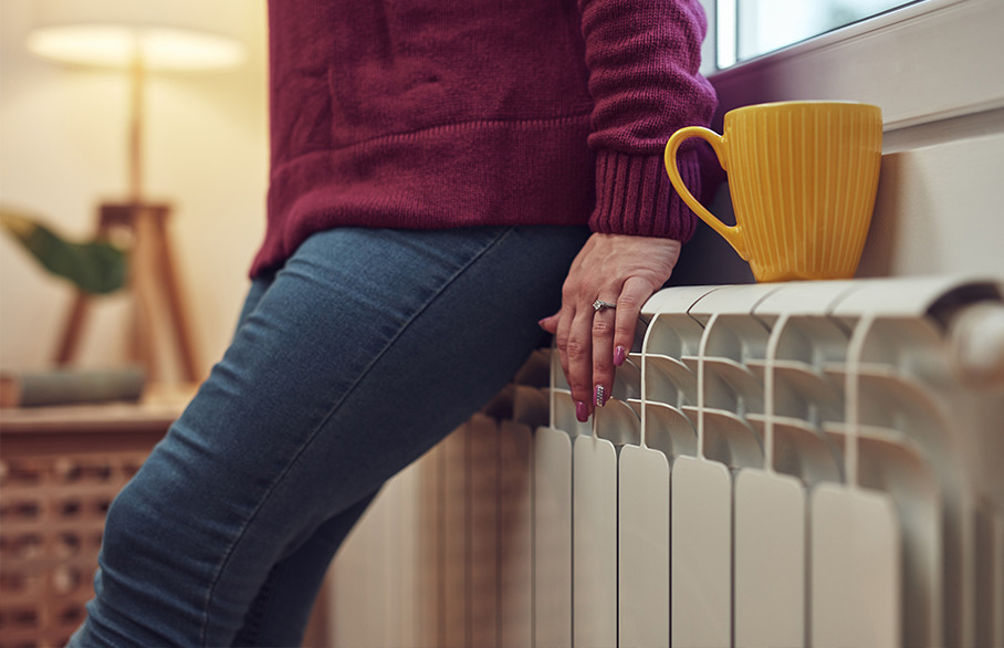 Leaning against a radiator