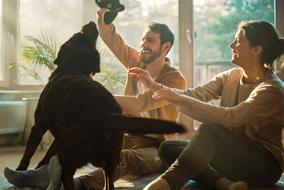 Happy couple with dog