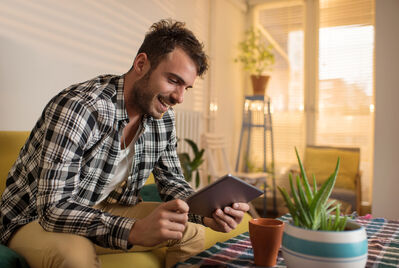 Person looking at their tablet computer