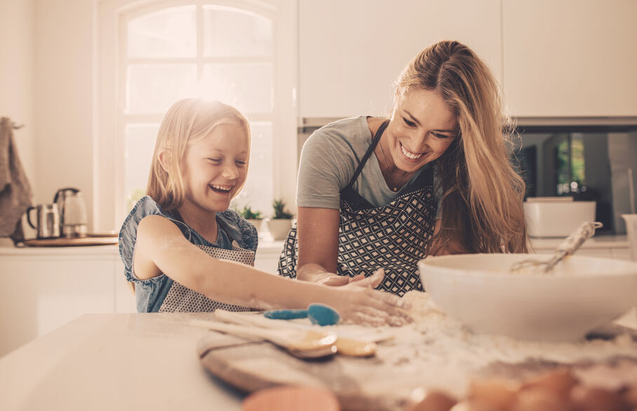 Mum and child baking in the kitchen