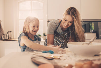 Mum and child baking in the kitchen