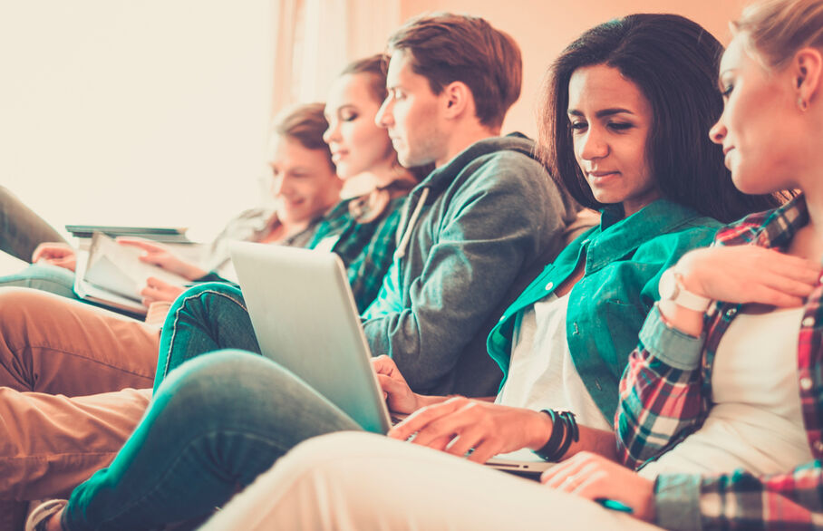 Students on a couch relaxing