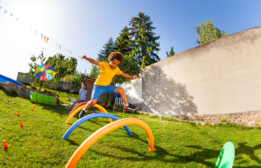 Children running and playing in a park
