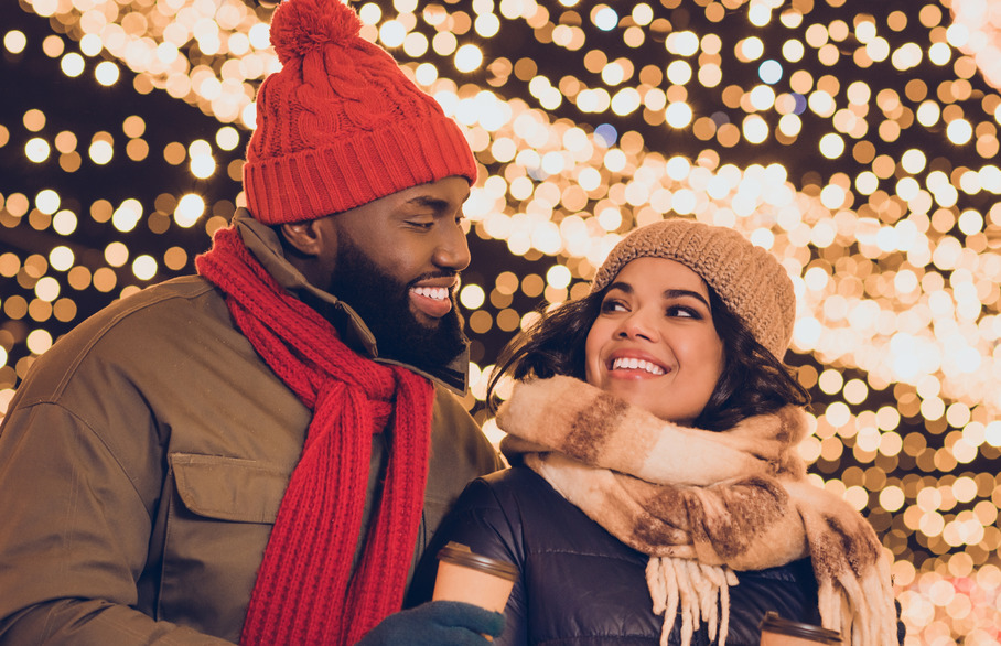 Man and a woman at a Christmas market