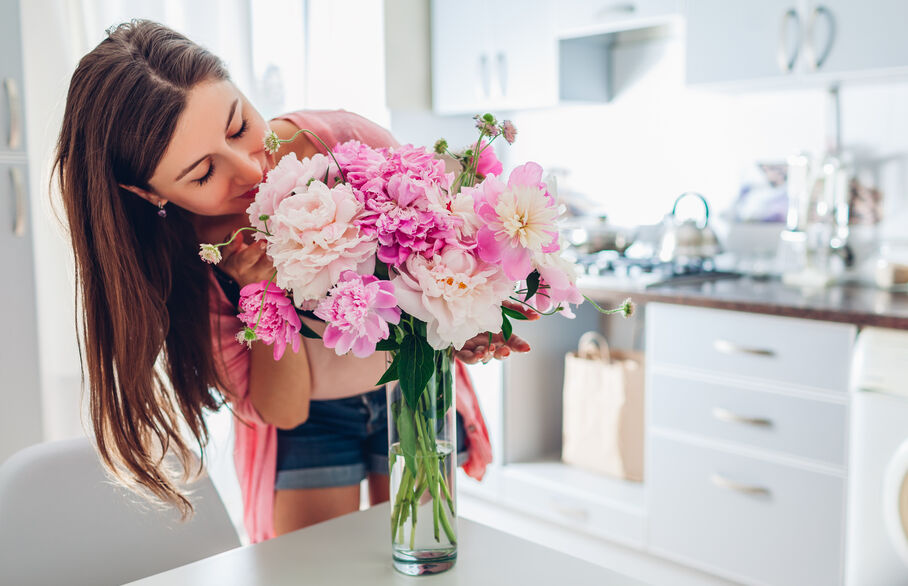 women holding flowers 