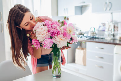 women holding flowers 