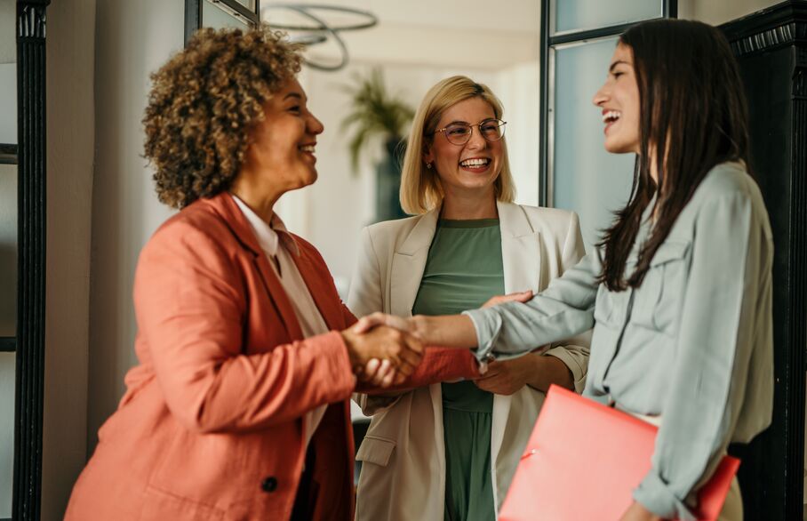 women shaking hands