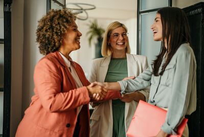 women shaking hands