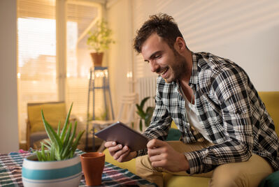 man on ipad 
