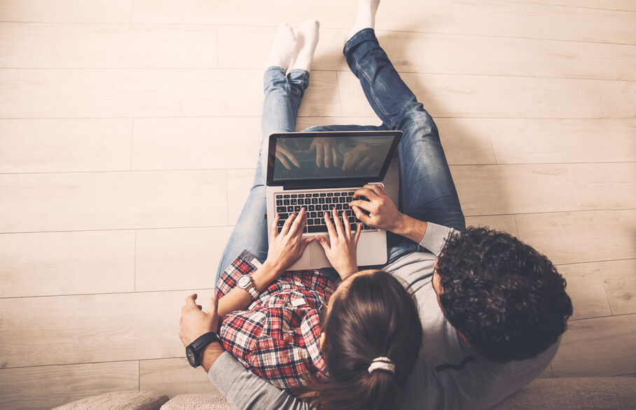 two people on laptop