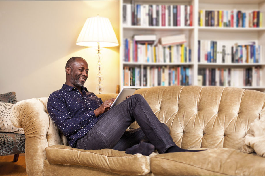 Tenant on sofa reading