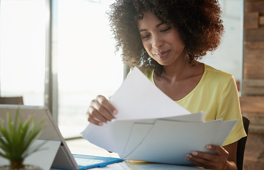 Woman looking through papers