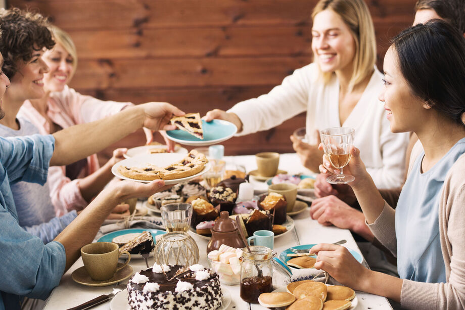 people sat round a dining table