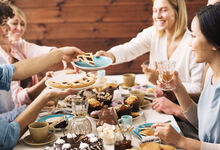 people sat round a dining table