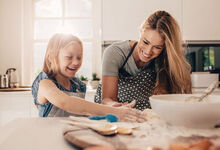 family baking in a kitchen