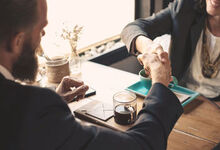 Two people shaking hands