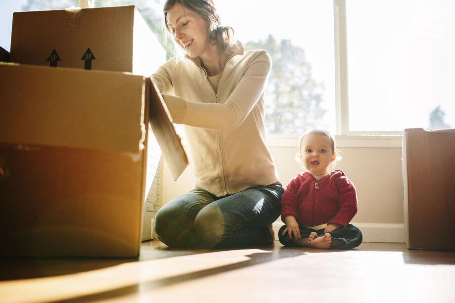 Family unpacking boxes