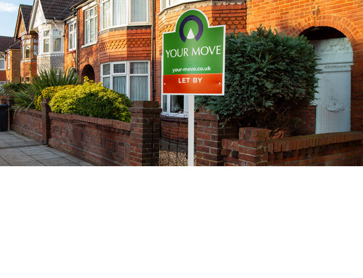 A Your Move 'Let By' board outside a house in the morning sun